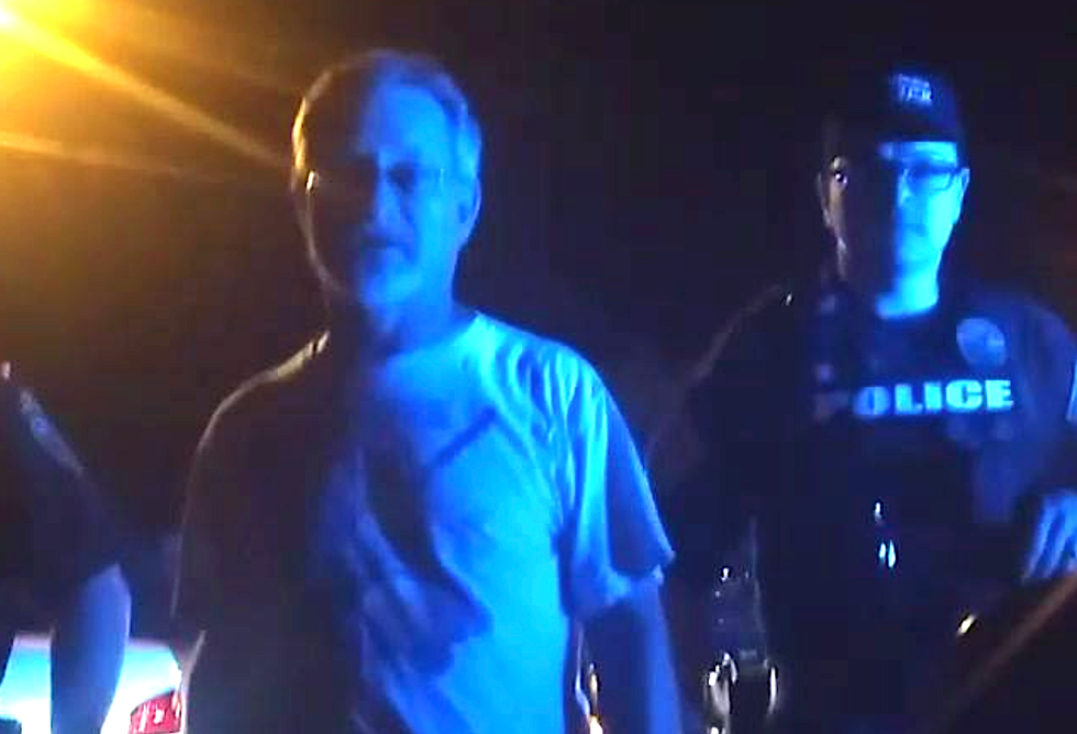 WATCH: Off-duty cop pulls gun on man for sitting in his parked car while black
