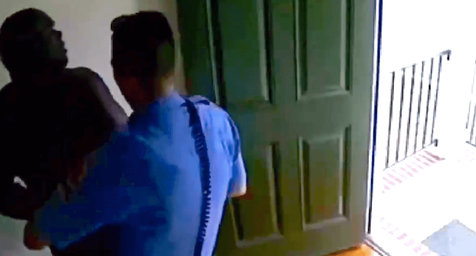 Black man held at gunpoint in his own home after cops mistake him for burglar