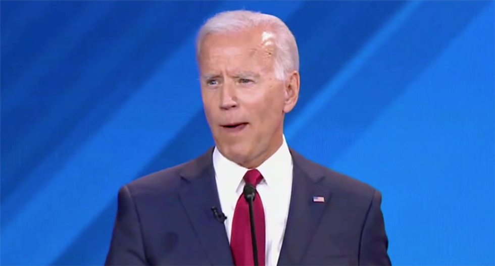 Joe Biden’s teeth appear to fall out during the Democratic debate — and the internet has thoughts