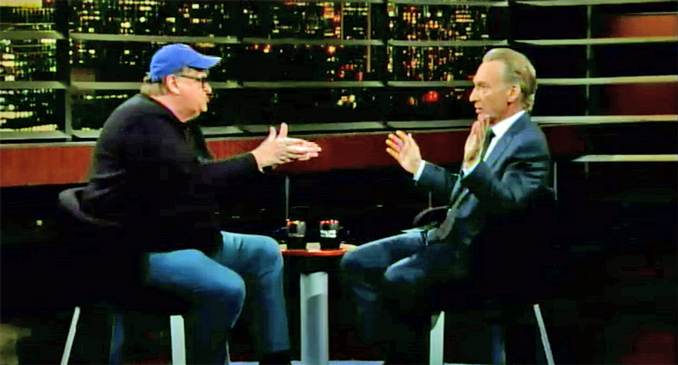 WATCH: Michael Moore got in shouting match with Bill Maher — and the comedian lost an expensive bet