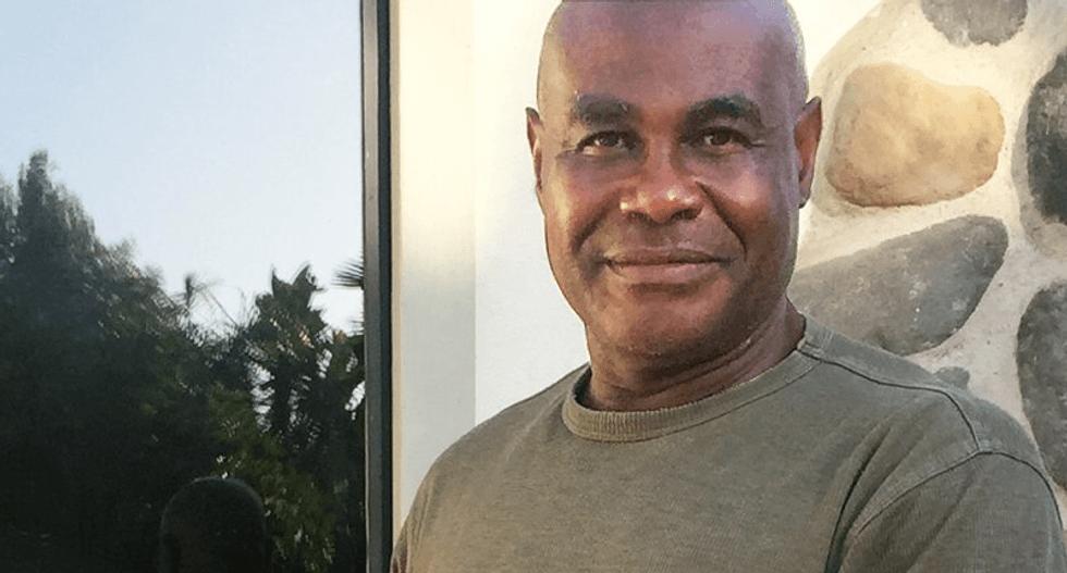 Black man walking his dog gets hunted as burglary suspect after white neighbor snaps picture of him and reports it as 'suspicious'