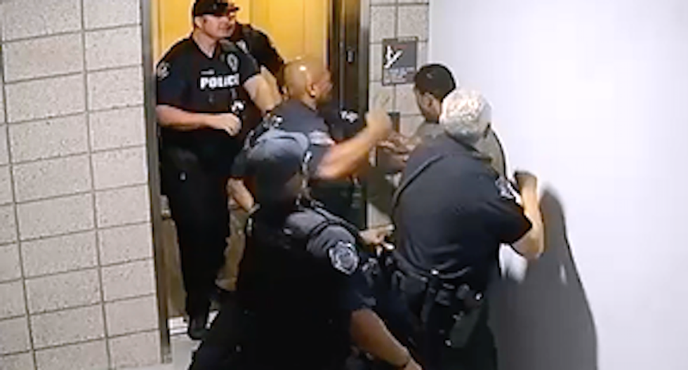 Video shows Arizona cops instantly start punching black man talking on cell phone