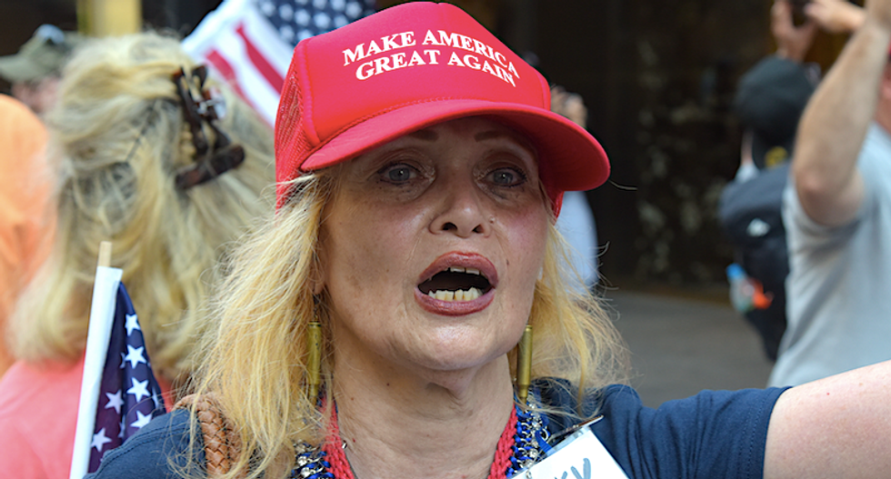 Peek inside the minds of Trump supporters who think the president is doing an awesome job with COVID