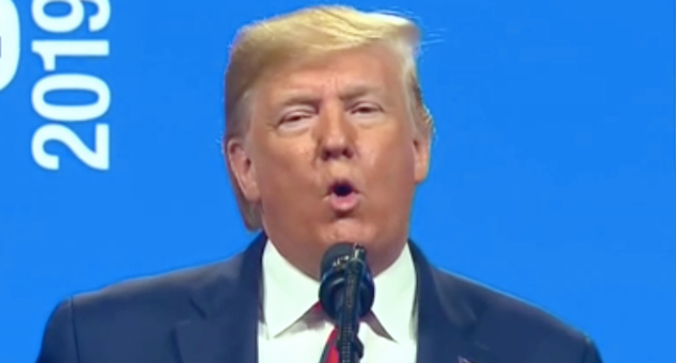 Trump attacks Obama and gloats about ‘keeping the oil’ in rambling speech to Chicago cops
