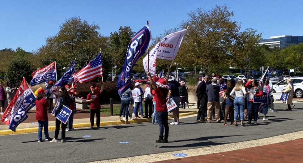 WATCH: Trump supporters descend on early voters in Virginia — and try to obstruct polling site