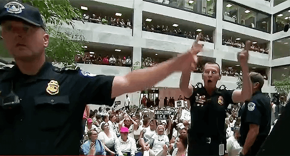 WATCH: DC cops tell press to leave immigration protest before they begin arresting women