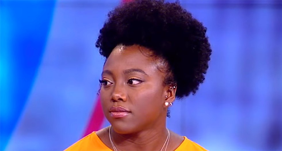 Cheerleader who was punished for taking a knee during football game wins $145K settlement