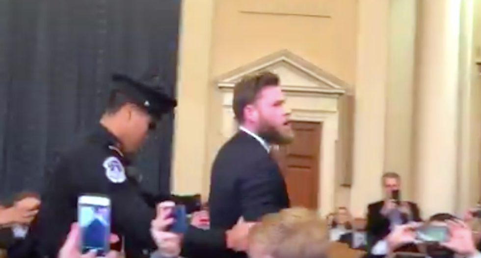 ‘Trump is innocent’: InfoWars host booted from impeachment hearing after shouting about ‘treason’