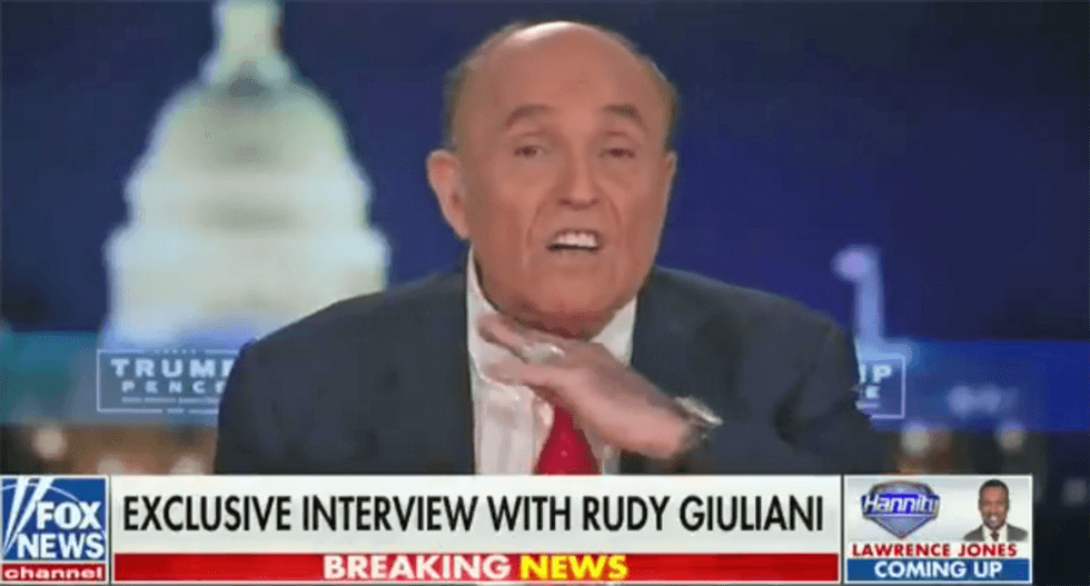 Giuliani makes throat-slashing gesture while complaining about ‘very bad’ Democrats on Fox News