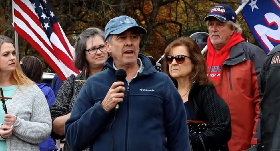 Oregon doctor faces suspension after boasting at Trump rally that he never wears a mask