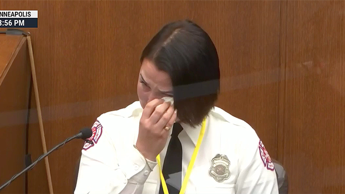 EMS officer sobs saying police wouldn't allow her to give George Floyd medical attention