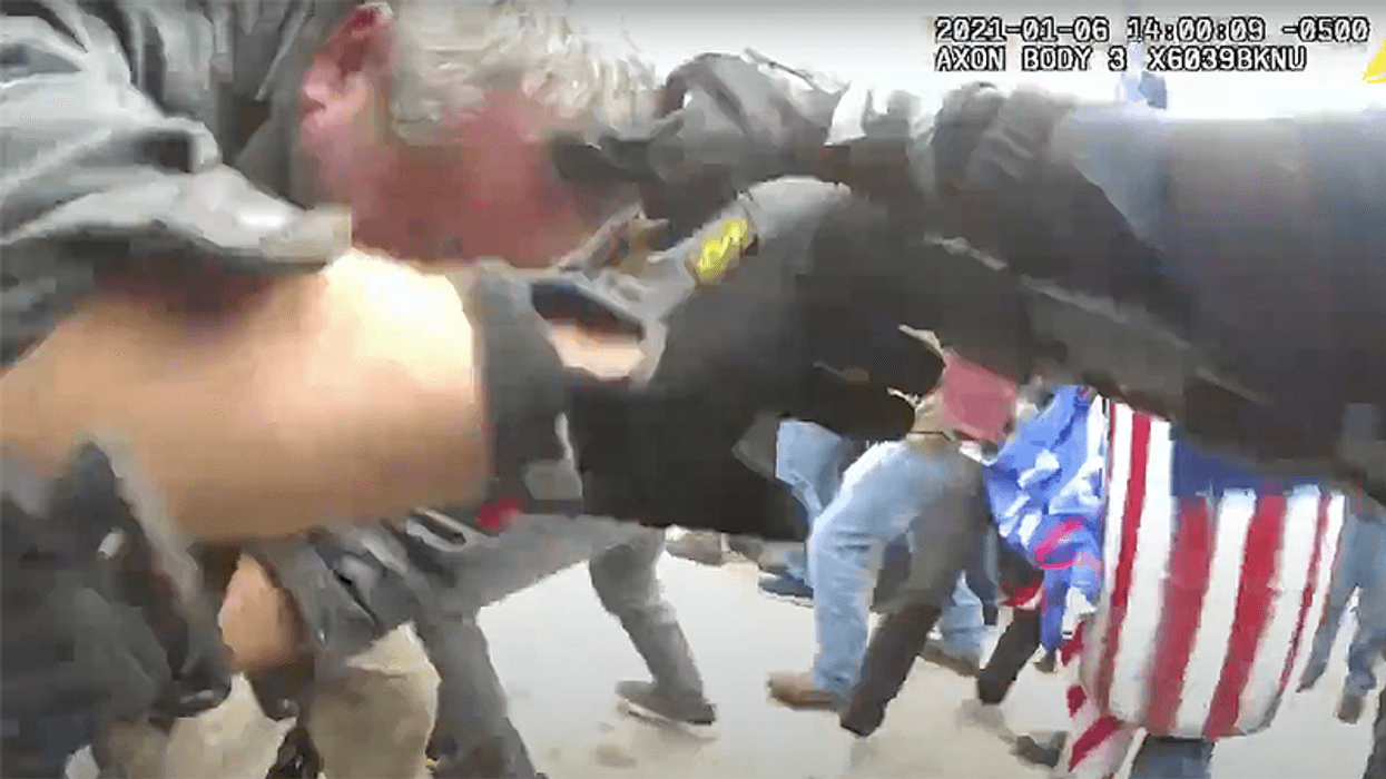 Never before seen videos show Capitol police officer being beaten with a skateboard in Jan. 6 attack