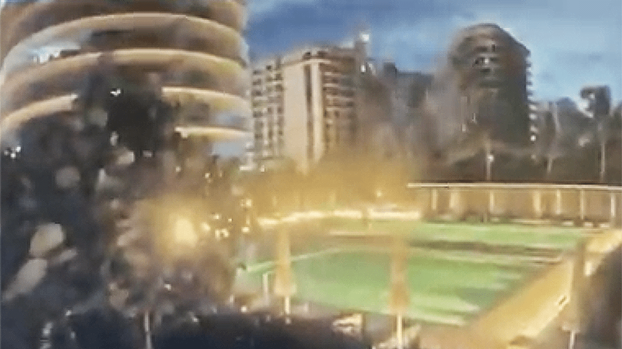 Surveillance video captures the horrifying moment the Surfside condo crumbled in Florida