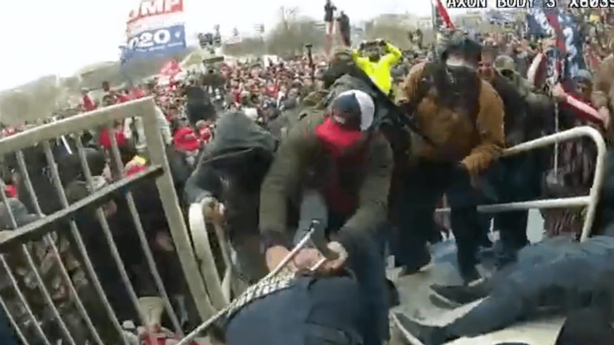 'You're going to die tonight': New video shows Capitol rioters brutally assaulting officers and dragging them down steps