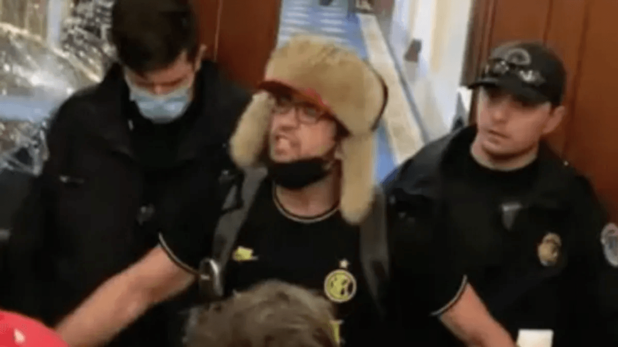 Court hearing devolves into a 'mess' as 'Helmet boy' Capitol rioter rejects plea deal and proclaims himself 'general counsel'