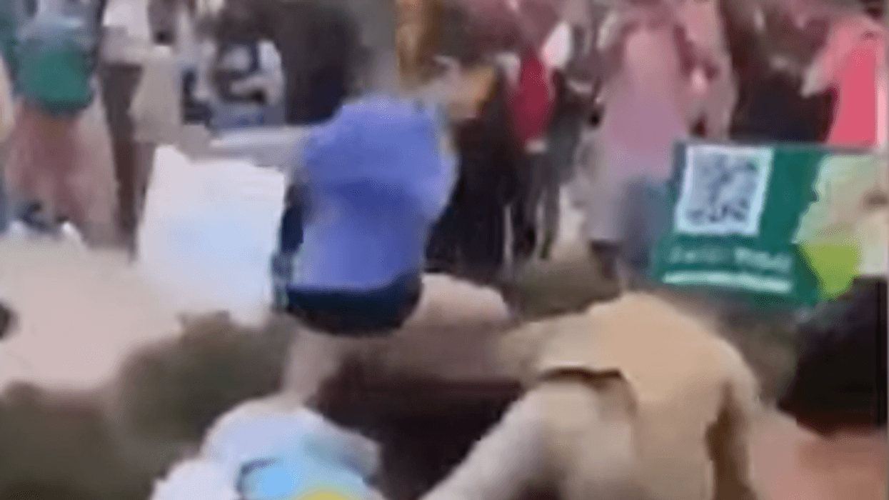 WATCH: Preacher with sign saying ‘women belong in the kitchen’ gets decked by college student