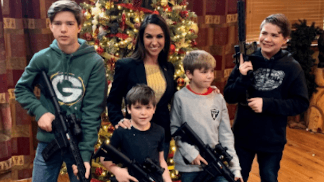 'Certifiably nuts': Lauren Boebert posts Christmas photo of her four sons brandishing assault rifles