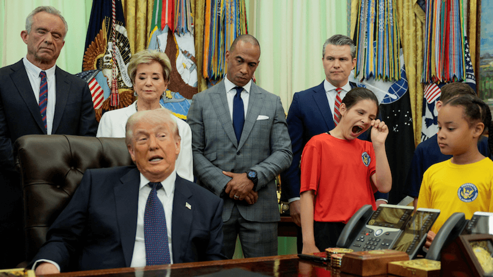 Observers taken aback by 'insane' Trump event with kids: 'Is RFK checking his cell phone?'