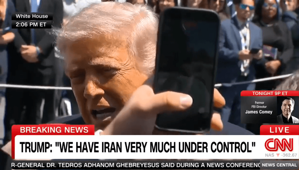 Chaotic moment disrupts Trump's press gaggle as heckler shouts 'stop the bloodshed!'