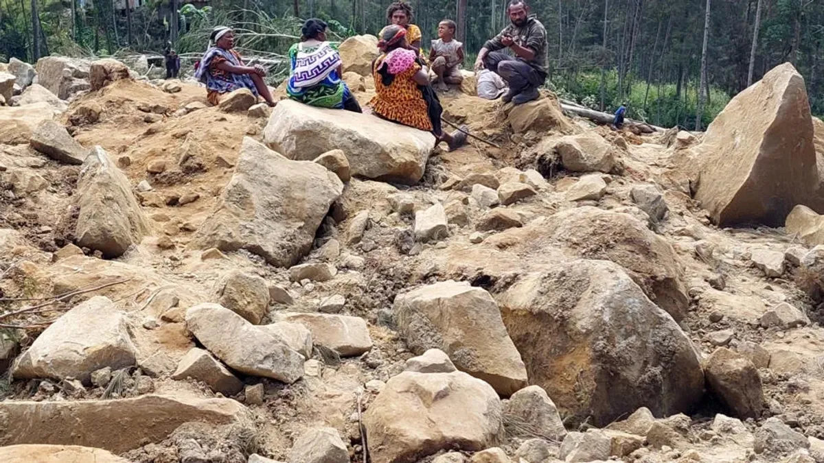 Papua New Guinea says more than 2,000 people buried in landslide