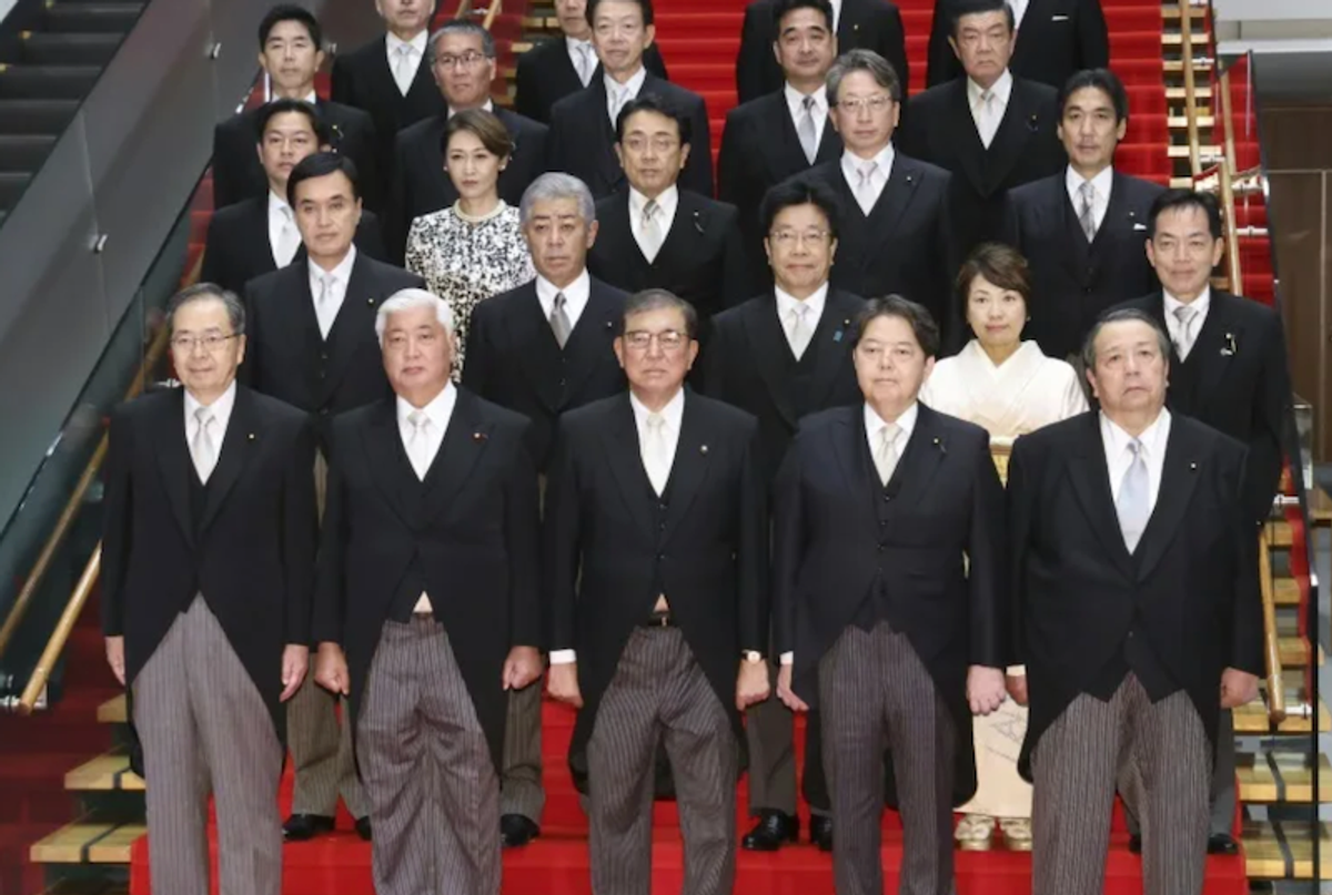 Japan govt admits doctoring 'untidy' cabinet photo