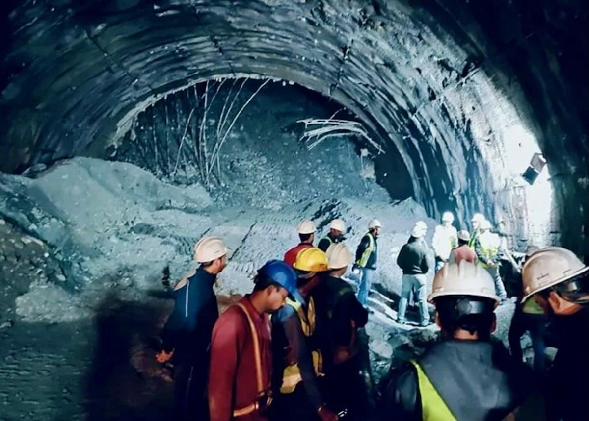 India warns freeing workers trapped for six days will 'take time'