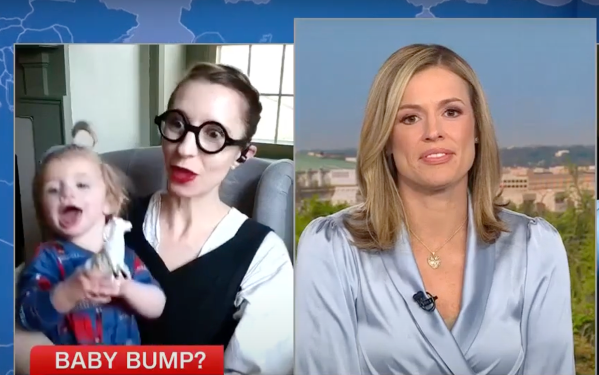 Pro-birth activist mom struggles with squirming baby during live CNN interview