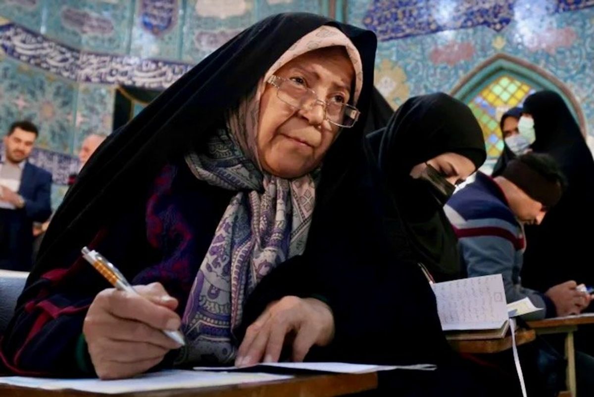 Iran counts ballots in vote seen favoring conservatives
