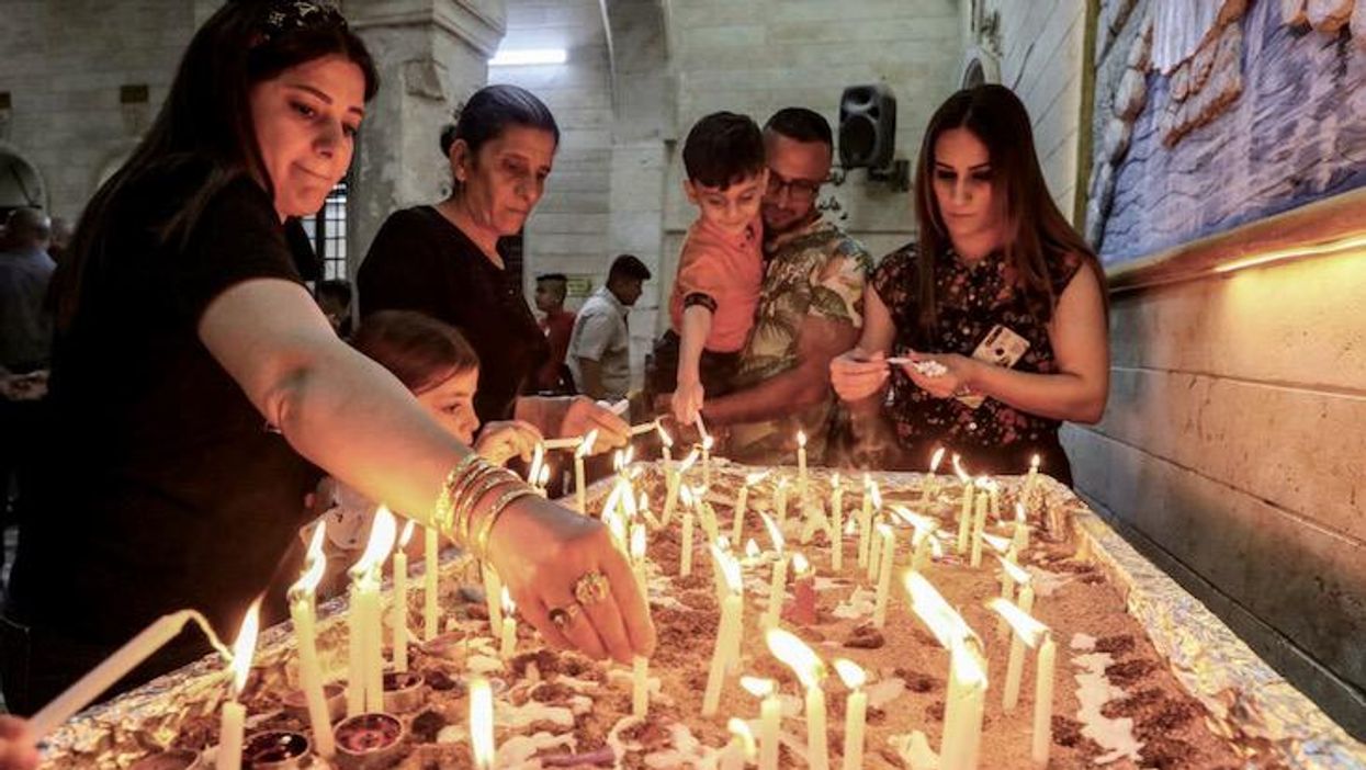 Iraqi Christians celebrate first Easter 'Holy Fire'