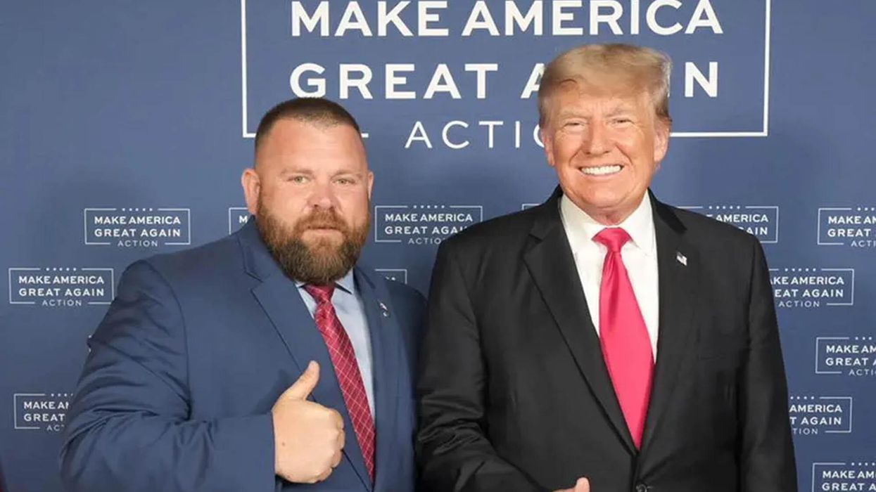 GOP House candidate who denies promoting QAnon said he believes 'everything' in it