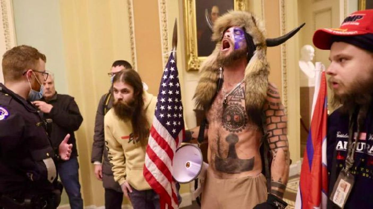 QAnon shaman accidentally unravels GOP impeachment defense: ‘He came at the request of the president’