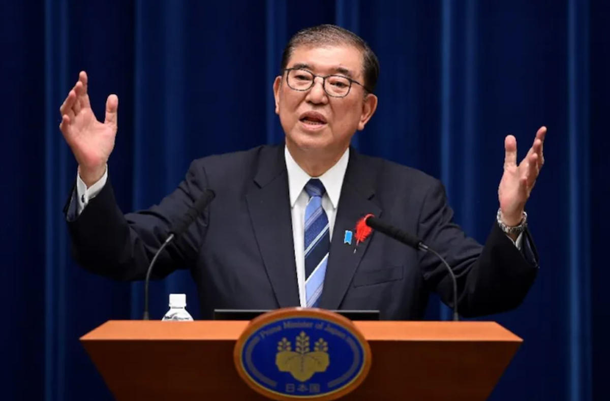 Lawmakers vote to keep embattled Ishiba as Japan PM