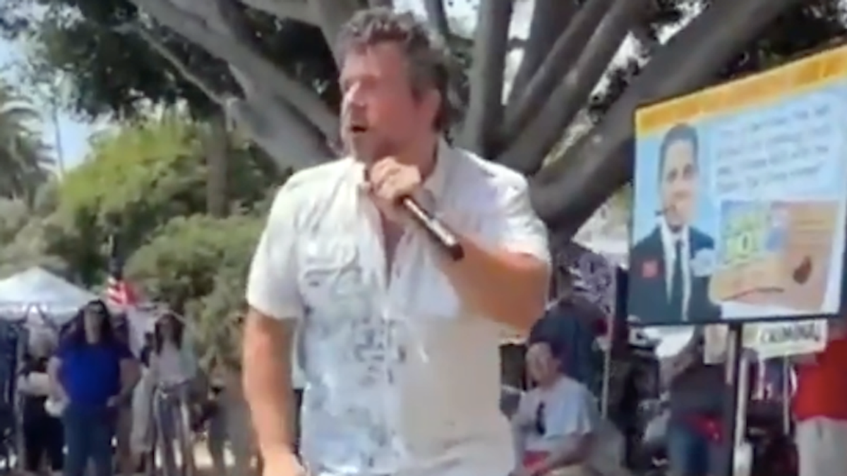 'Get your guns!' Furious anti-vaxxer bellows violent threats against door-to-door volunteers