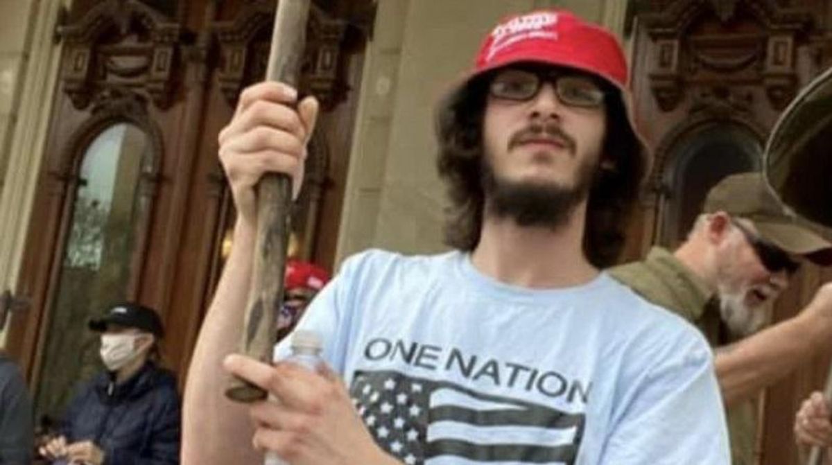 MAGA rioter was fired from five jobs last year for 'unwillingness to comply with mask and vaccine mandates': feds
