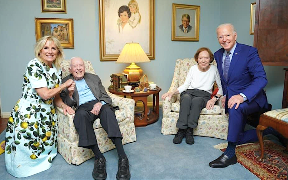 ‘Mind-bending’ photo of giant Bidens and tiny Carters baffles the internet