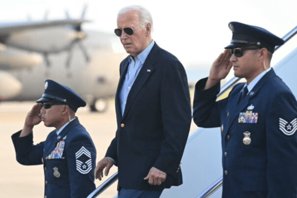 Biden back on campaign trail as pressure mounts