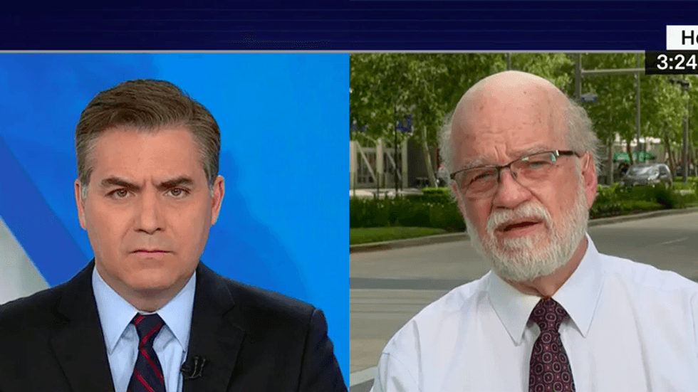 'Your way doesn't work' Acosta schools NRA board member who claimed he's praying for scared children
