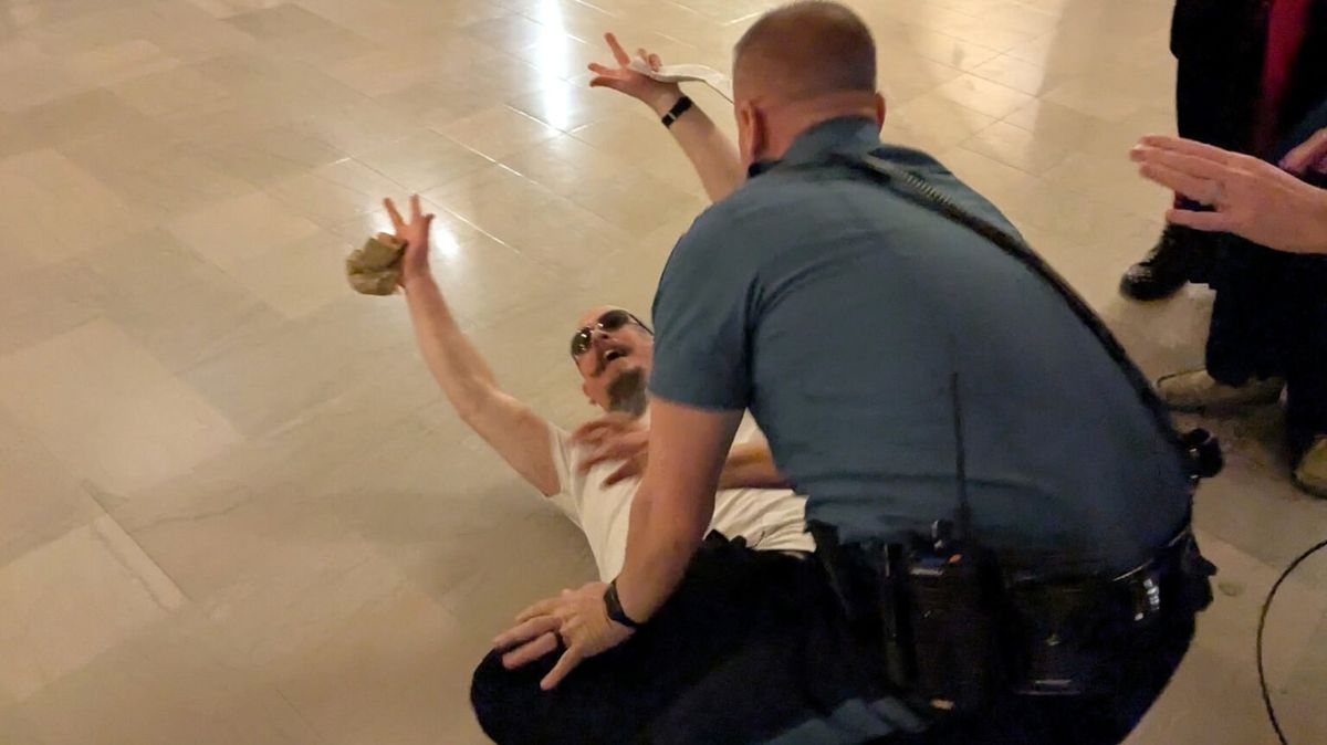 'He punched me in the face': Arrests as Satanists and Catholics clash in Kansas Capitol