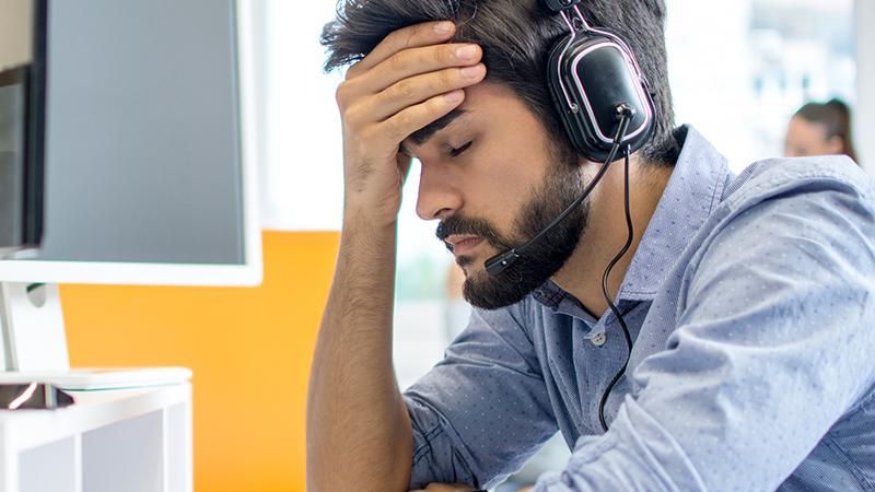 frustrated call center guy