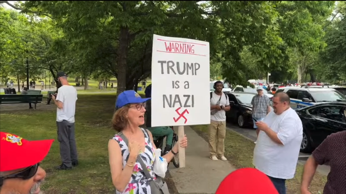 Watch: Woman with 'Trump is a Nazi' sign crashes ex-president's Bronx rally