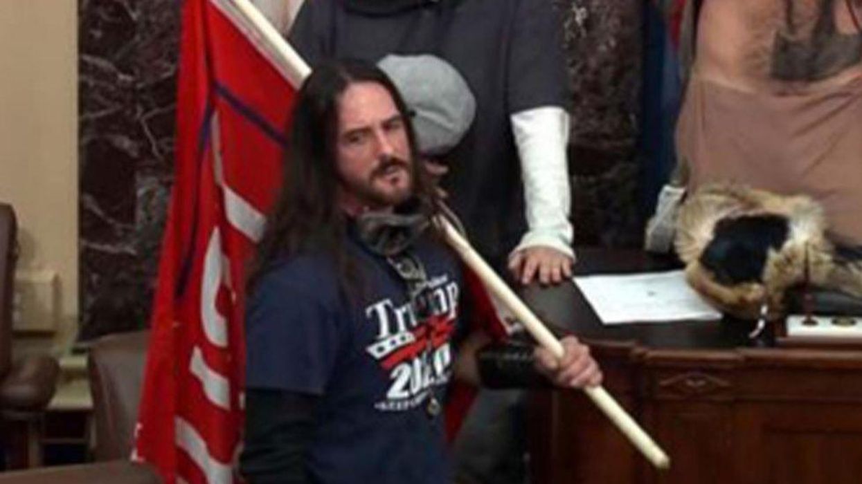 Insurrectionist Paul Hodgkins sentenced to 8 months in prison after judge cites Trump flag