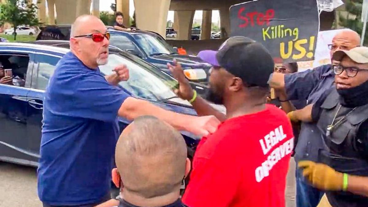 WATCH: Angry white man attacks Black Lives Matter protesters -- and cop lets him walk away