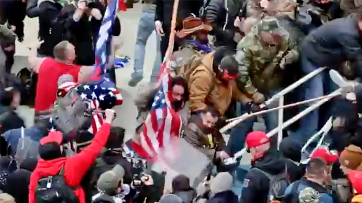 Arrested Capitol rioter claims he thought officer he beat with US flagpole was 'antifa': report