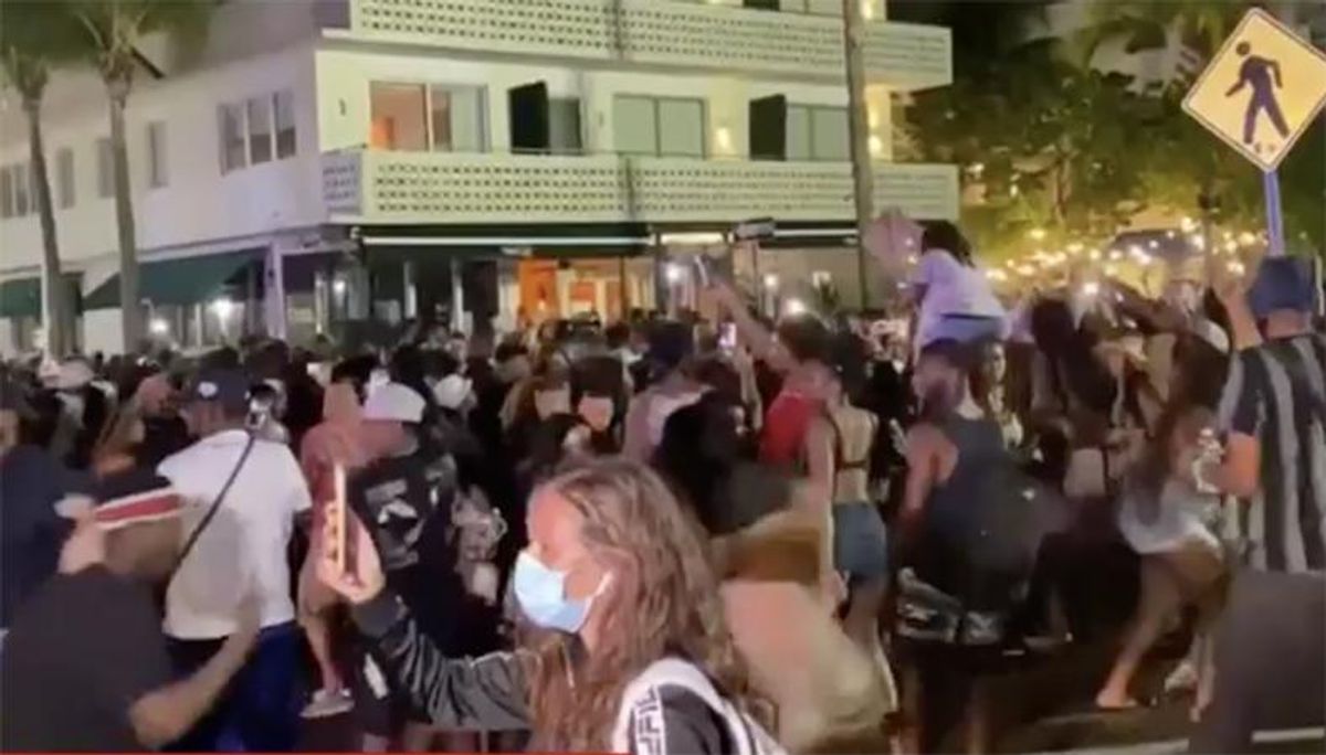 'Don't come here': Miami mayor warns away visitors as spring breakers turn streets into a 'superspreader event'