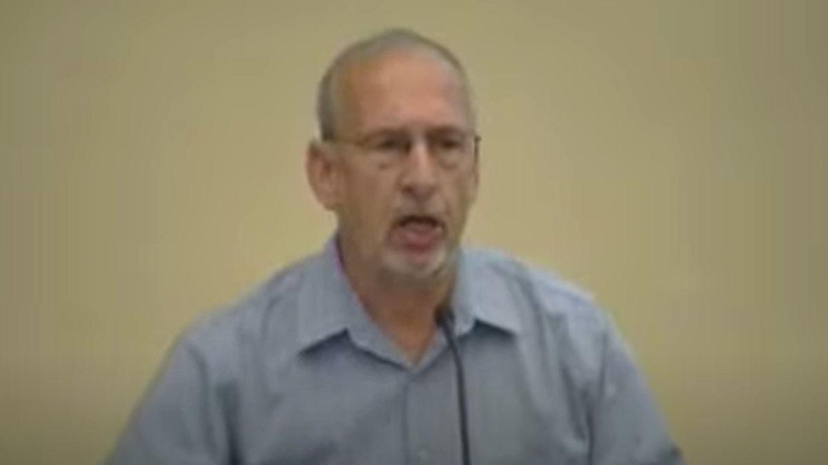 School board member reads horrifically racist blog post after he's called out for threats against parents of trans kids