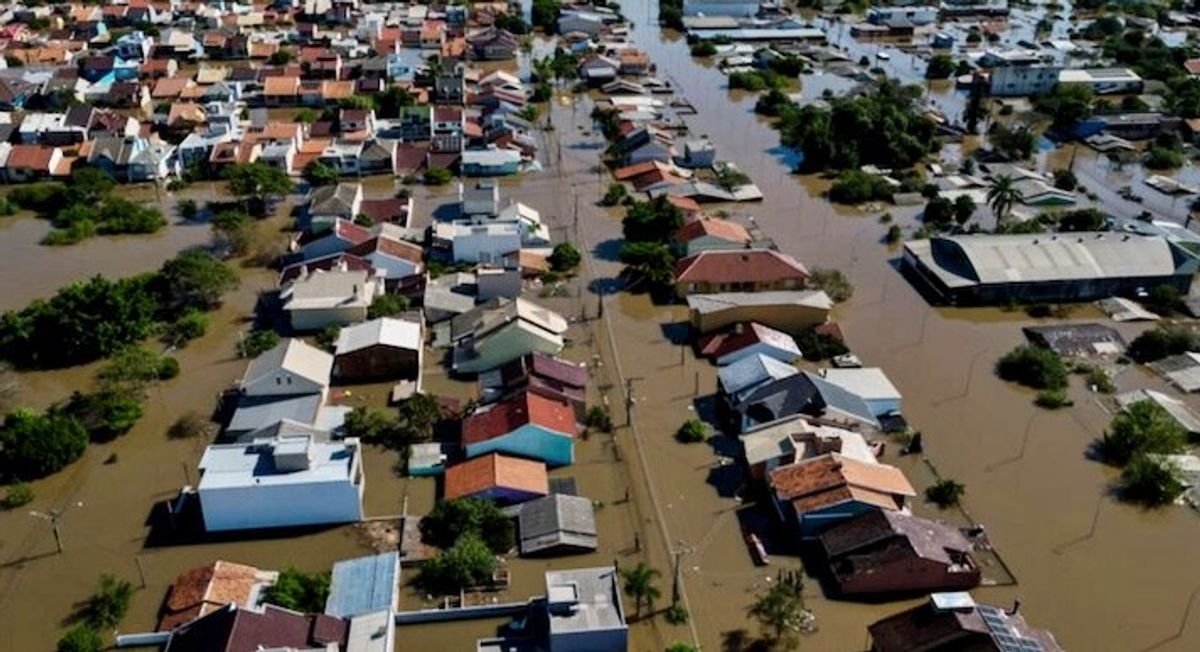 Brazilians queue for precious water as flood damage intensifies