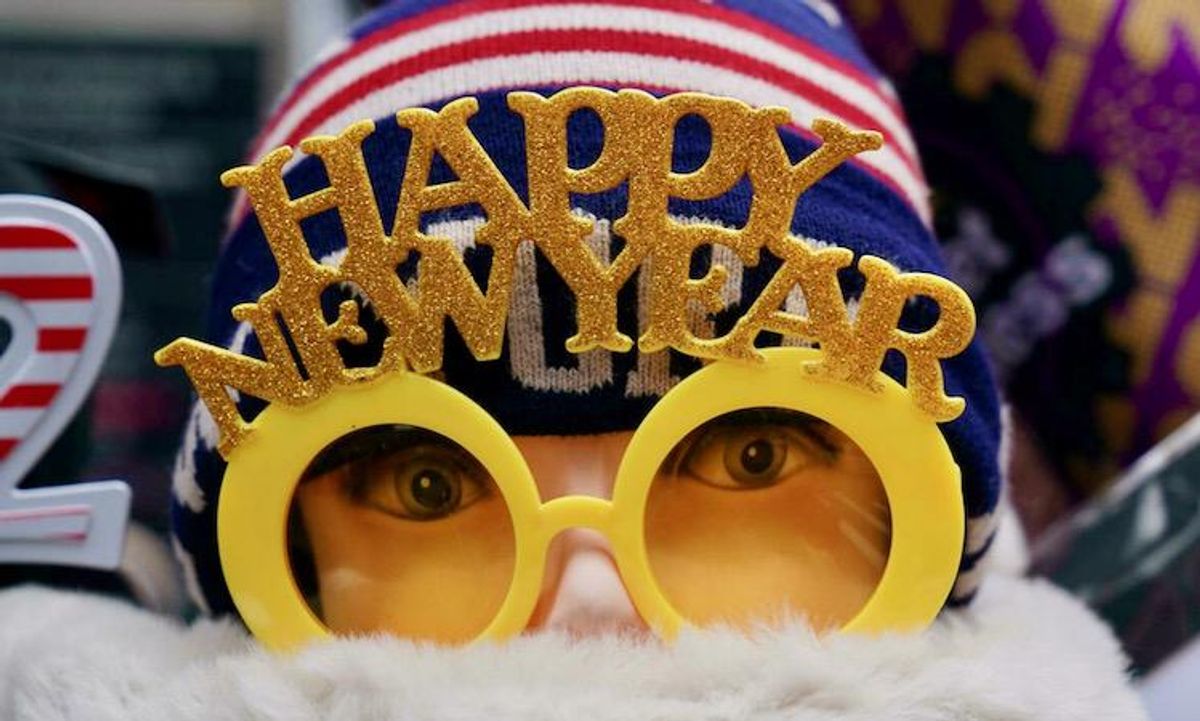 World rings in New Year under COVID cloud