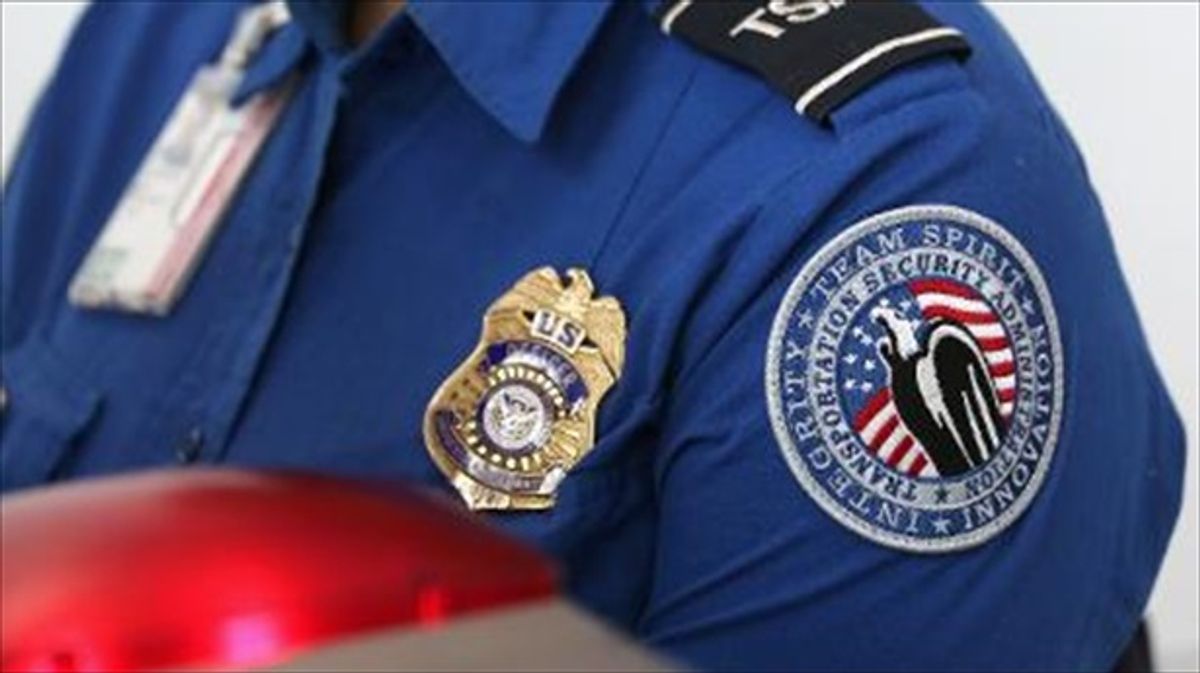 Man arrested after trying to board plane with semi-automatic rifles and a fake US Marshal's badge