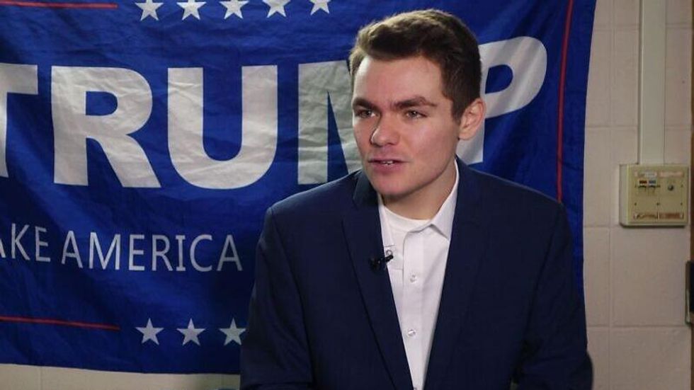 Trump's white supremacist dinner date put on No Fly List after threatening to strangle flight attendant: report