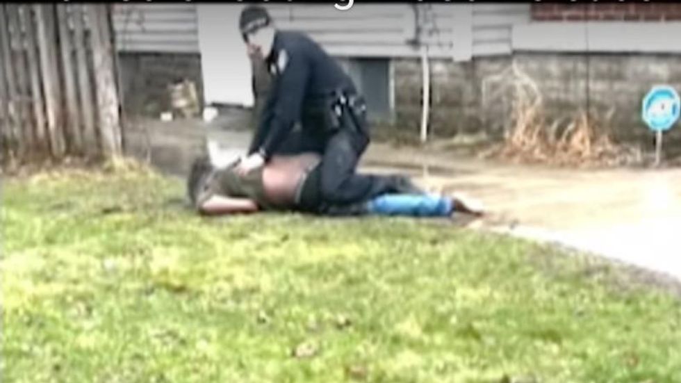 Video shows cop fatally shooting Black man in the back amid struggle -- Grand Rapids braces for protests